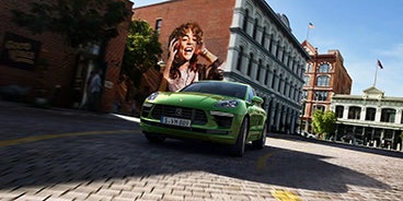 Blue Porsche Macan Turning a Corner in Mill Valley CA