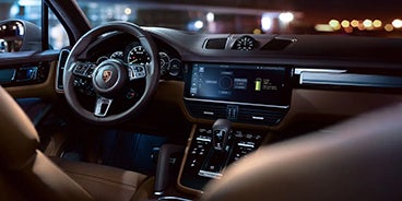 Couple Driving Porsche Cayenne in Mill Valley CA